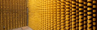 Wall of sound absorbers